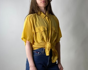 canary yellow blouse