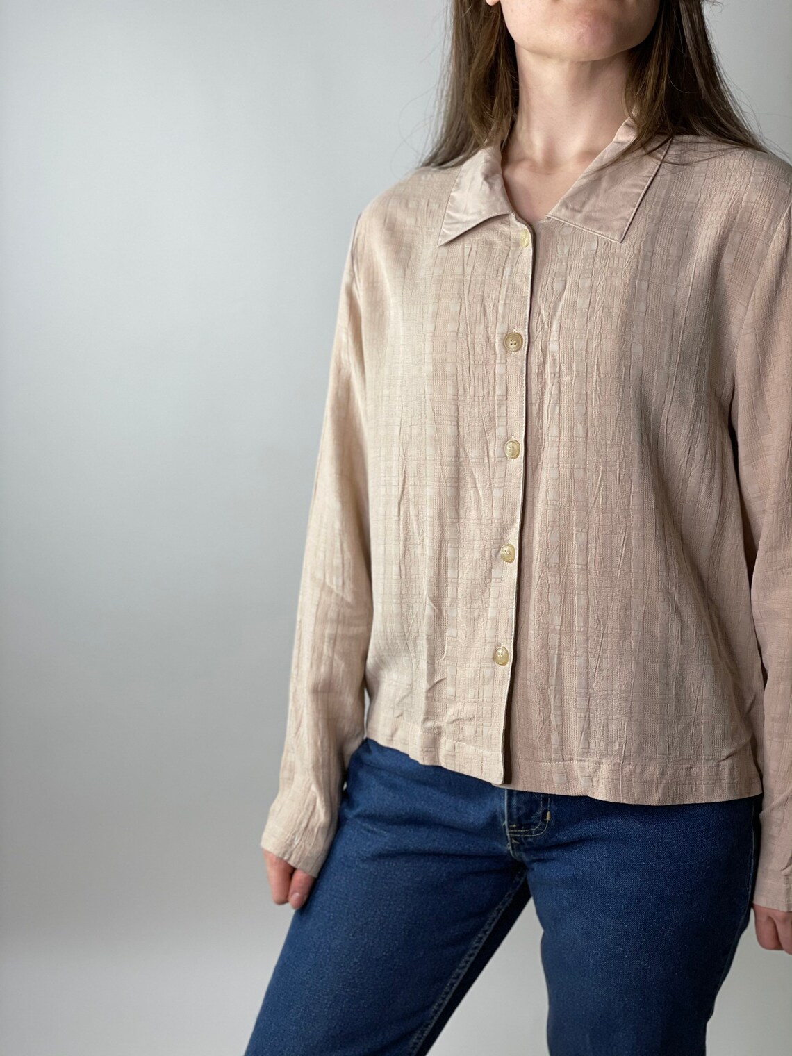 tan button up blouse