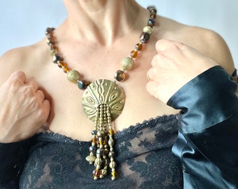 Vintage 60's Carnival Glass Bead and Brass Tassel Necklace