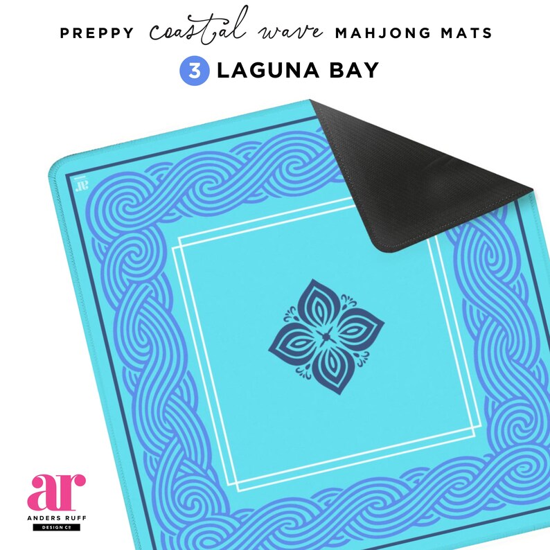 May include: A turquoise Mahjong mat with a coastal wave design and a dark blue floral center. The mat features the text "PREPPY coastal wave MAHJONG MATS" and "3 LAGUNA BAY". The logo "ar ANDERS RUFF DESIGN CO" is in the bottom left corner.