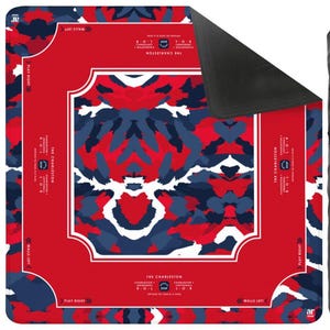 May include: A square game mat featuring a red, white, and navy blue abstract camouflage pattern. The mat includes printed text and directional arrows for The Charleston game, with a black underside and a folded corner revealing the dark backing.