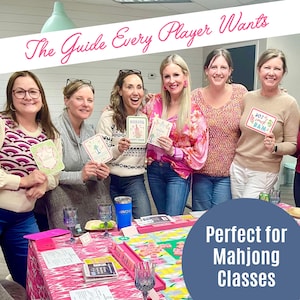 May include: A group of women holding cards and smiling around a table with a pink and white patterned tablecloth. The text "The Guide Every Player Wants" is displayed above them. The text "Perfect for Mahjong Classes" is displayed in a blue circle.