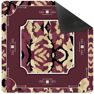May include: A square game mat featuring a maroon, beige, and black abstract pattern. The border includes text reading THE CHARLESTON, CHARLESTON 1, R-O-L, OPTION TO PASS 0-3 TILES, WALLS LEFT, and PLAY RIGHT. One corner is folded back to reveal a black underside.