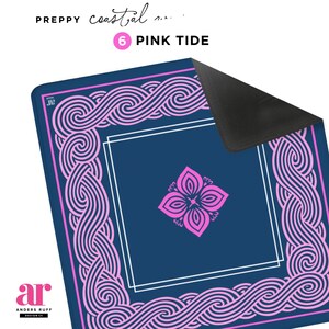 May include: A navy blue mat with a pink floral design in the center and a pink wave-like border. The text "PREPPY coastal" and "6 PINK TIDE" are at the top. The logo "ar ANDERS RUFF DESIGN" is at the bottom.