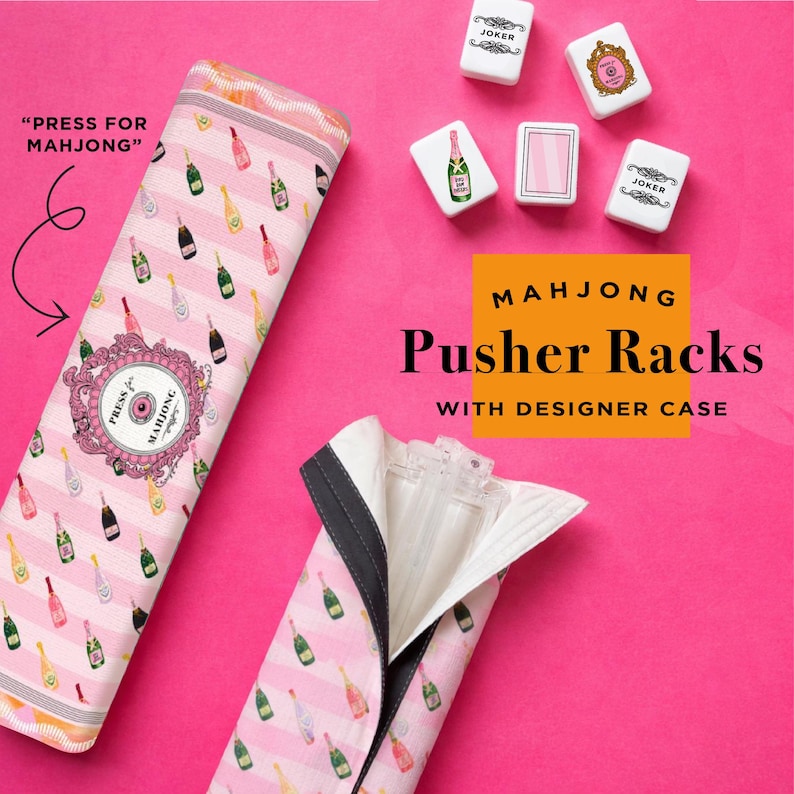 May include: Pink and white striped Mahjong pusher rack case with champagne bottle pattern. The case is open, revealing clear plastic pusher racks. The image also shows Mahjong tiles and the text "PRESS FOR MAHJONG".