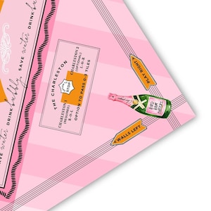Pu&ograve; includere: Illustrazione di un gioco da tavolo rosa e bianco con testo e una grafica di bottiglia di champagne. Il testo include "The Charleston", "Play Right" e "Walls Left". La bottiglia di champagne ha un'etichetta rosa con la scritta "Bird Bam Cheers".