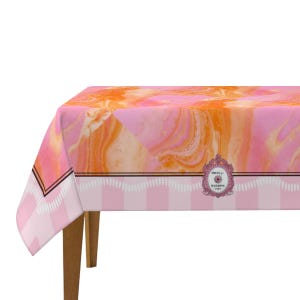 May include: A pink and orange marble patterned tablecloth with a pink and white striped border. The tablecloth has a decorative emblem with the text "PRESS P. MAHJONG". The tablecloth is draped over a wooden table.