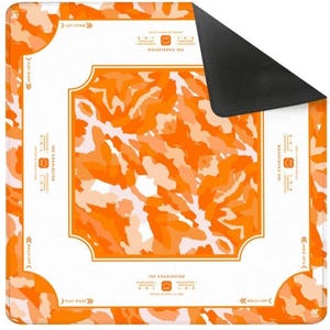 May include: A square game mat featuring a vibrant orange and white camouflage pattern. The white border includes the text THE CHARLESTON, directional arrows labeled PLAY RIGHT and WALLS LEFT, and instructions for passing cards during gameplay.
