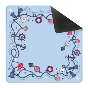 May include: A light blue square mat with a black underside, featuring a nautical-themed border of dark blue ropes, red and white life buoys, pink seashells, anchors, ship wheels, and white stars, with text including "WALLS LEFT PLAY RIGHT".