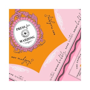 May include: A colorful graphic design with the text "PRESS for MAHJONG" inside a pink and white oval frame. The design features orange and pink sections with the phrases "Got mahjong?" and "Save water drink bubbly".