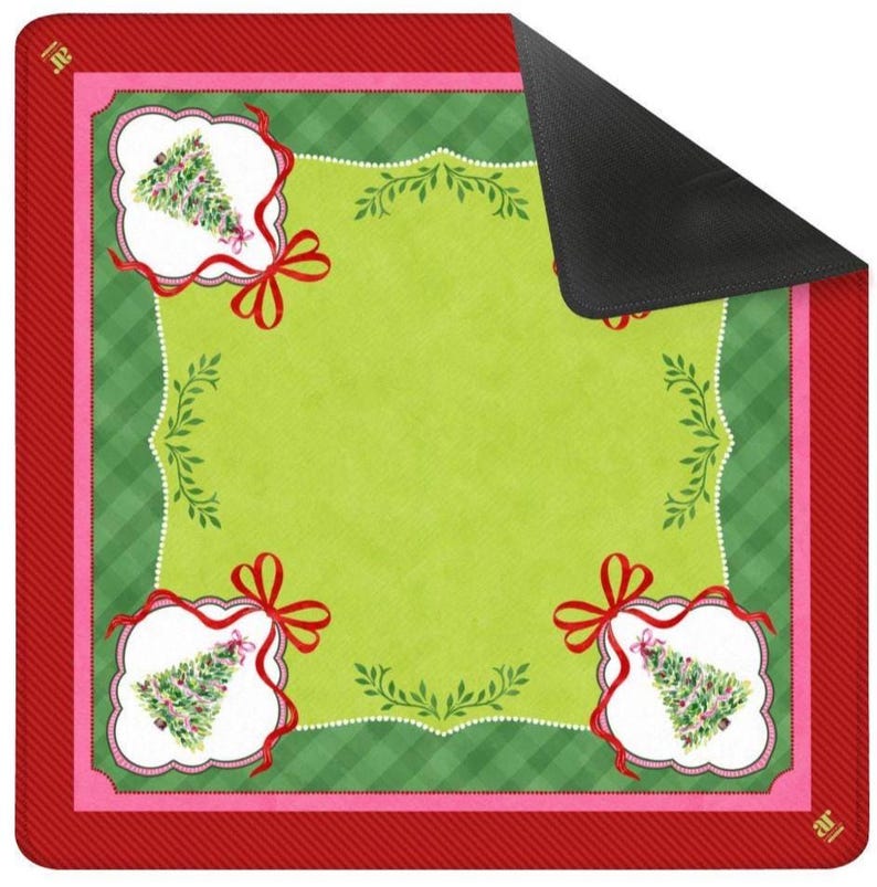 May include: A festive Christmas-themed mat with a red border and a green center. The mat features a repeating pattern of Christmas trees in ornate frames, accented with red bows and decorative green foliage. The mat's design is perfect for the holiday season.