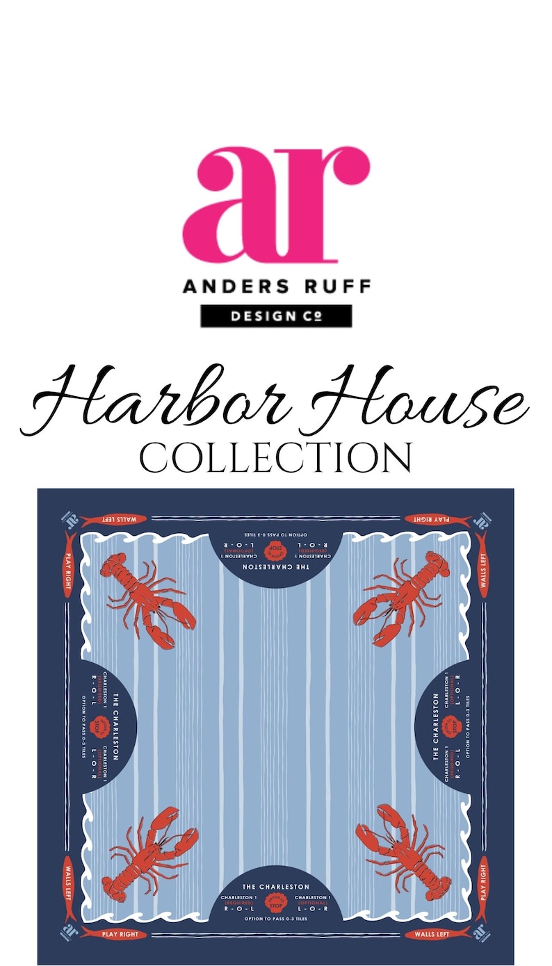 May include: A navy blue and white nautical-themed design with red lobsters and the text "The Charleston." The design includes the text "Harbor House Collection" and the Anders Ruff Design Co. logo.
