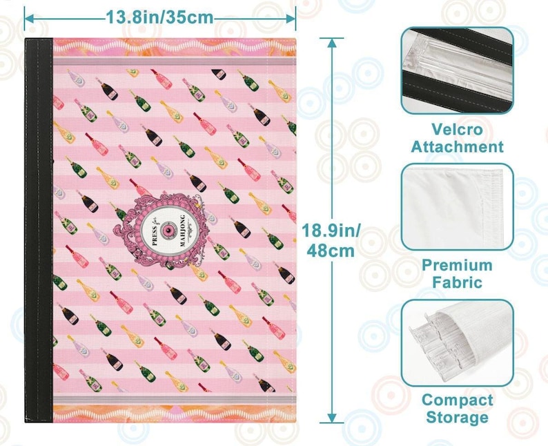 May include: Pink Mahjong game mat with a champagne bottle pattern, measuring 13.8 inches by 18.9 inches. Features a black spine and the text "Press for Mahjong" in a decorative frame. Includes Velcro attachment, premium fabric, and compact storage.