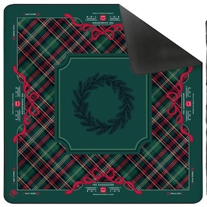 May include: A green and red plaid game mat with a central wreath design. Red ribbons and text are placed around the edges. The text reads "THE CHARLESTON" and "PLAY RIGHT".