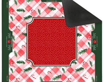 May include: A square mahjong mat with a dark green border and a red and white checkered pattern featuring green pine sprigs and candy canes. The centre has a red square with white dots. Text includes The Charleston and play directions.