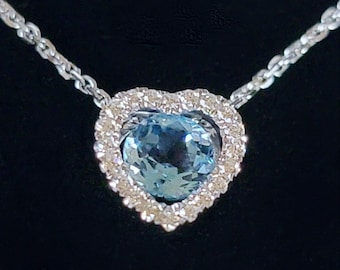 14K White Gold Blue Topaz and Diamond Heart Shaped Pendant with a 14K White Gold Pendant Chain