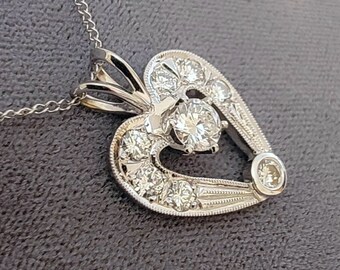 14K White Gold Diamond Heart Shaped Pendant on a 14K Gold Pendant Chain