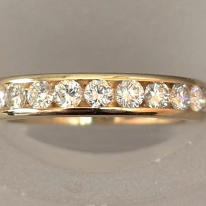 14K Yellow Gold 1.00 Carat Total Weight Channel set Diamond Band style Ring