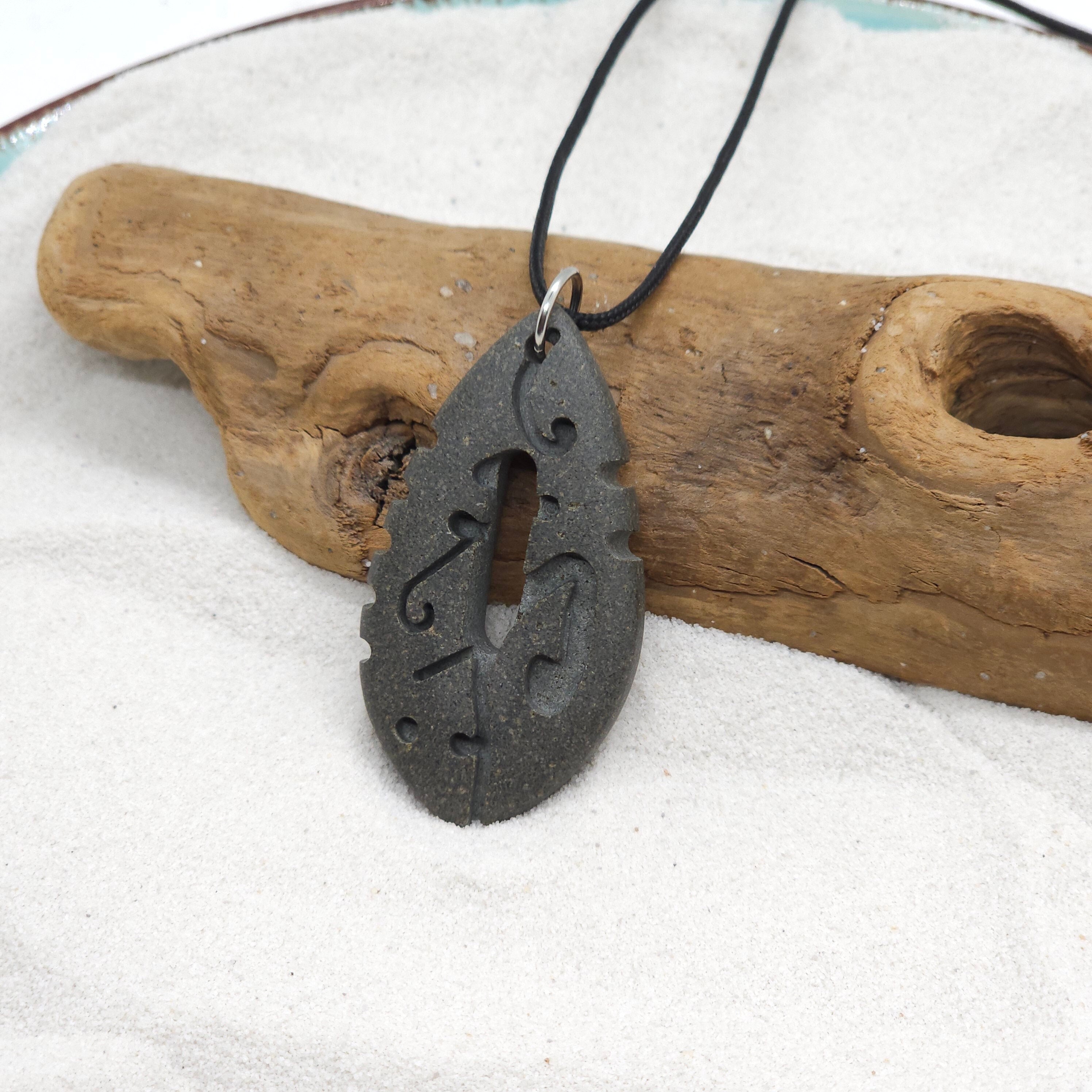 Carved stone pendant discount