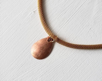 Gold short necklace with copper lure pendant (N)