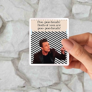 May include: A square sticker with the text "Poo-poo heads! Both of you are poo-poo heads!" and a photo of a man pointing. The background has black and white diagonal stripes.