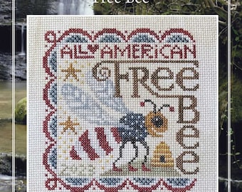 May include: Cross-stitch pattern featuring a bee with the words "All American Free Bee" in a red, white, and blue color scheme. The pattern is framed with a decorative border.