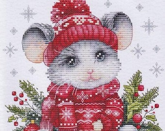 May include: Cross-stitch pattern featuring a cute mouse wearing a red hat and sweater, surrounded by Christmas decorations. The text "Christmas Mouse 2024" is displayed at the top. The image has a festive, holiday theme.