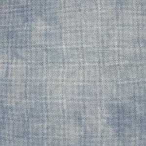 May include: A close-up of a light blue fabric with a cross-stitch pattern. The fabric has a mottled appearance, with darker blue areas creating a cloud-like effect. The texture is visible, showing the woven threads.