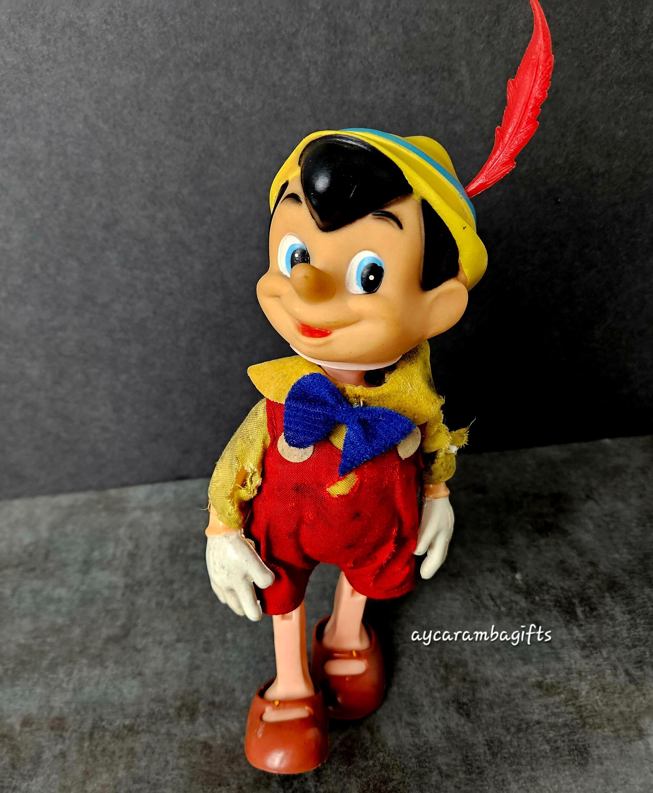 Pinocchio doll disney on sale