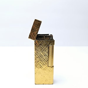 ダンヒル 金色 ライター スイス製 Dunhill ダンヒル ローラータイプ ロゴ入り ガスライター