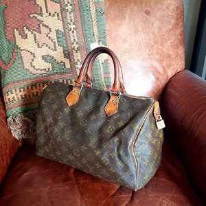 Louis Vuitton Speedy 30 Louis Vuitton 12 Duffel Bag Louis Vuitton Monogram Satchel 12 Classic Louis Vuitton 12 Handbag image 1