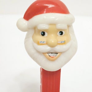 Vintage PEZ Candy Dispenser Santa Claus with Spectacles Footed Red Stem Made in Hungary Collectible Christmas Pez Candy Dispensers 2002