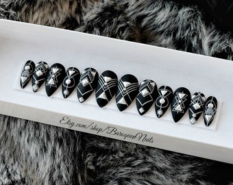 Custom Black Gel Press On Nails With Dark Base, White Geometric Print, And Metallic Stud Accents Alternative Style Nails