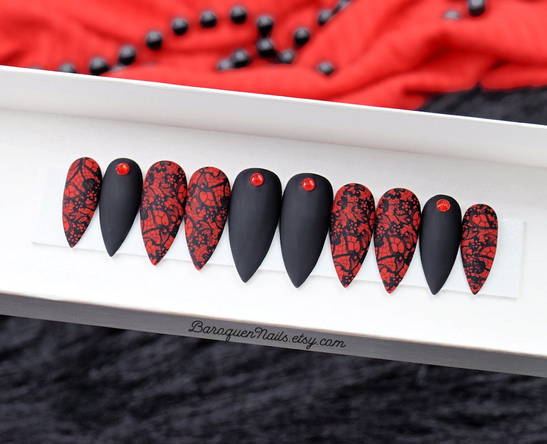 livingdeadgirl999 - Fill with matte black and red with gold accent nail and gold  nail gems #beautevilnailsbyjessica #instanails #livingdeadgirl999 #nailtech  #sqovalnails #accentnails #goldsparkle #matteblack #mattered #nailgems