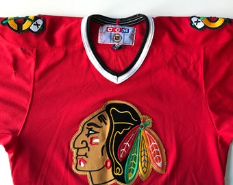 pink blackhawks jersey