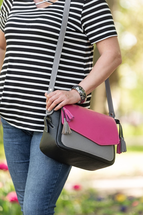 Pink leather messenger bag hot sale