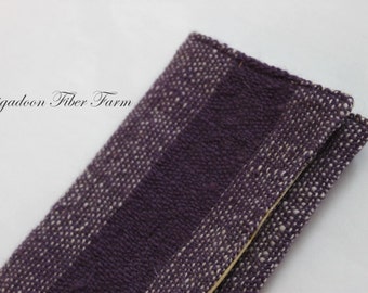Hand woven clutch , 1 pocket, silk brocade lining, wool shell, purple, cream, yellow.