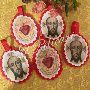 Stop, The Sacred Heart of Jesus and The Holy Face of Alicante are with me. Scapular.