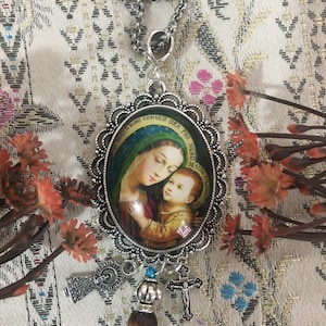 Our Lady of Good Counsel. Pendants, Keychains, and Brooches.