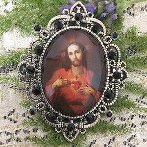 Brooches of the Sacred Heart of Jesus.