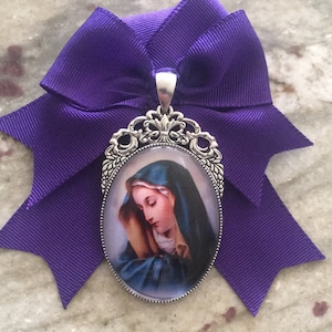 VIGEN of SORROWS. Brooch medallion. Holy Romero, Holy Romero, let the bad come out and the good come in.