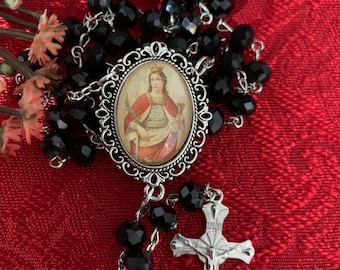 SAINT BARBARA. Rosary beads.