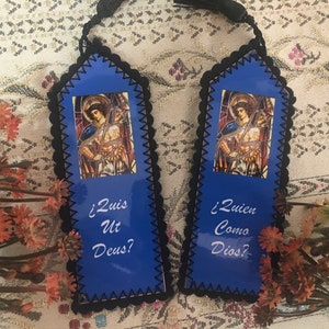 Saint Michael the Archangel. Who is like God. Quis ut Deus. Page separator.