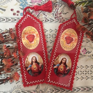 Fermati, il Sacro Cuore di Gesù è con me. Separatore di pagina.