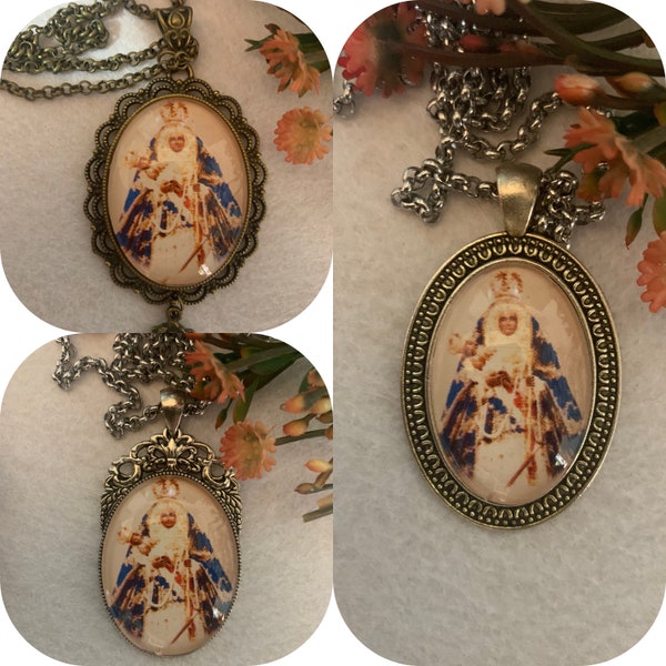 LA CANDELARIE. Vierge de Candelaria. Pendentifs, porte-clés et broches.