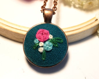 Hand Embroidered Teal Linen Pendant: Vintage Floral Style, Antique Copper Plated