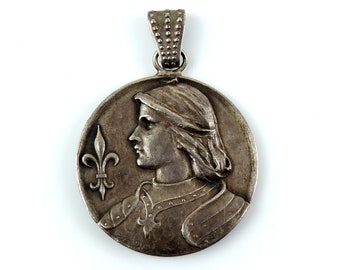 Antieke Franse Jeanne d'Arc-medaille: hanger van verzilverd messing