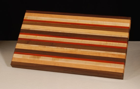 this board is big enough for the big jobs Made of multicolored hardwoods Large Traditional Hardwood Cutting Board