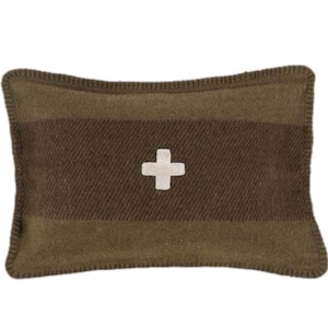 May include: Rectangular decorative pillow with a brown and olive green striped pattern. A white cross is centered on the pillow. The pillow has a stitched border.