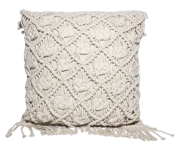 white macrame pillow